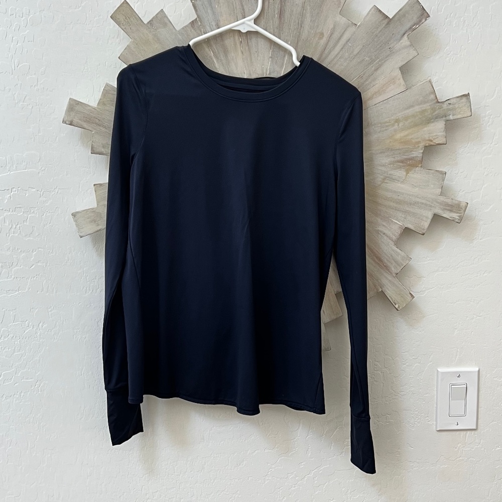 Athleta long sleeved workout tops/thumb holes and tie back. size S.